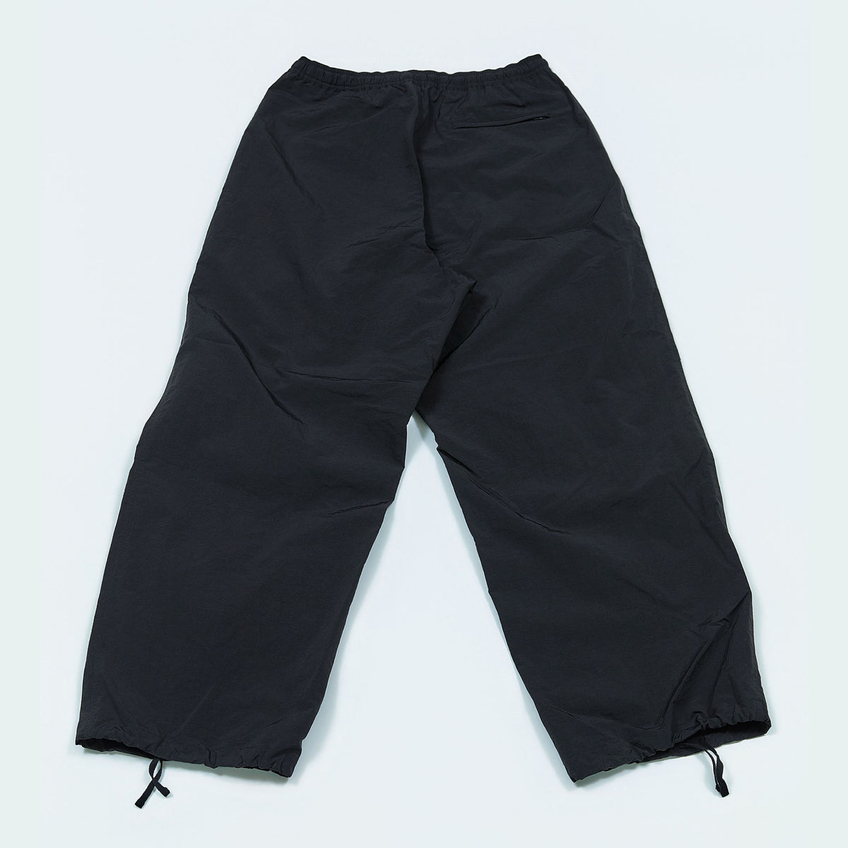 NYLON TRACK TROUSERS “MINDFULNESS SWIMMING” ー BLK