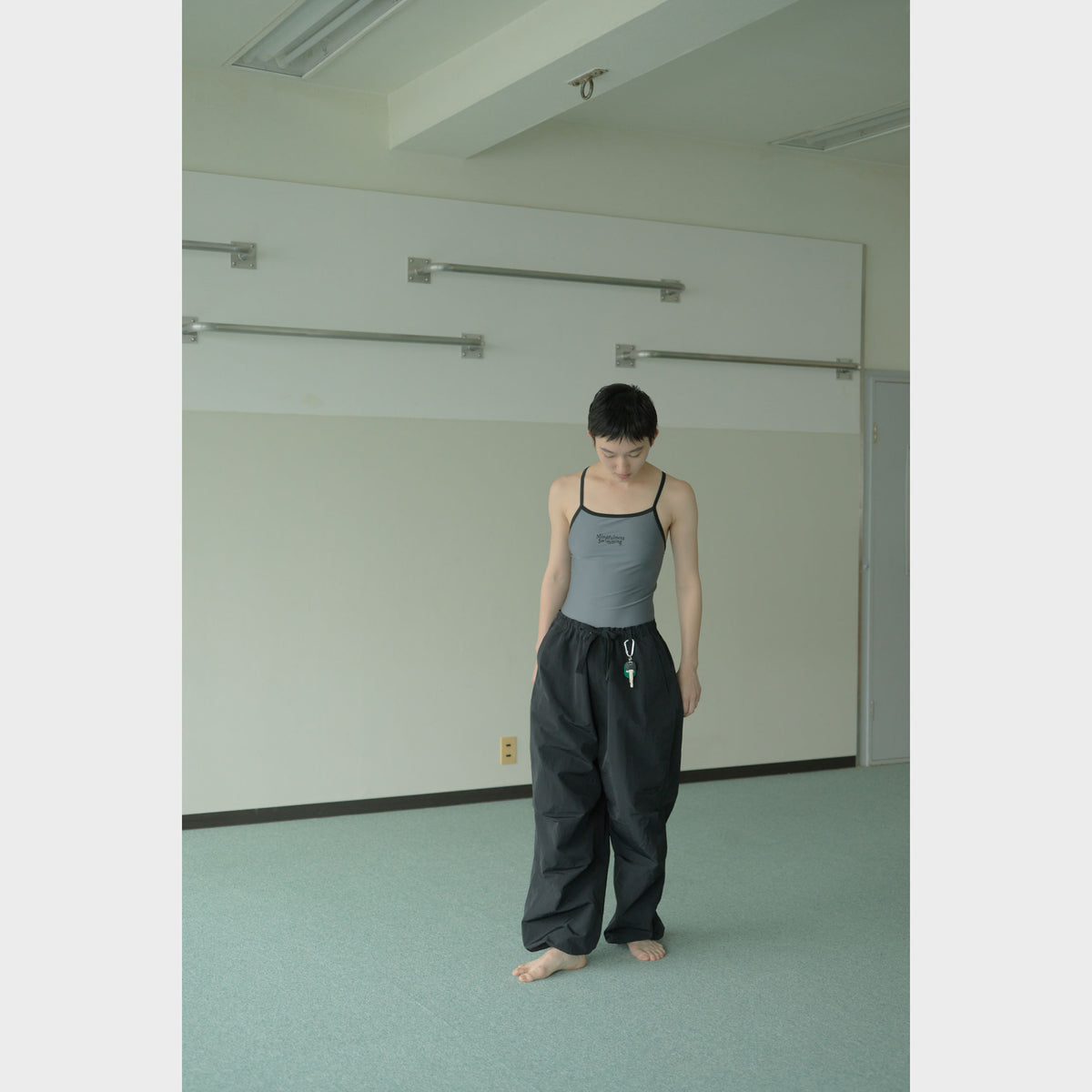 NYLON TRACK TROUSERS “MINDFULNESS SWIMMING” ー BLK
