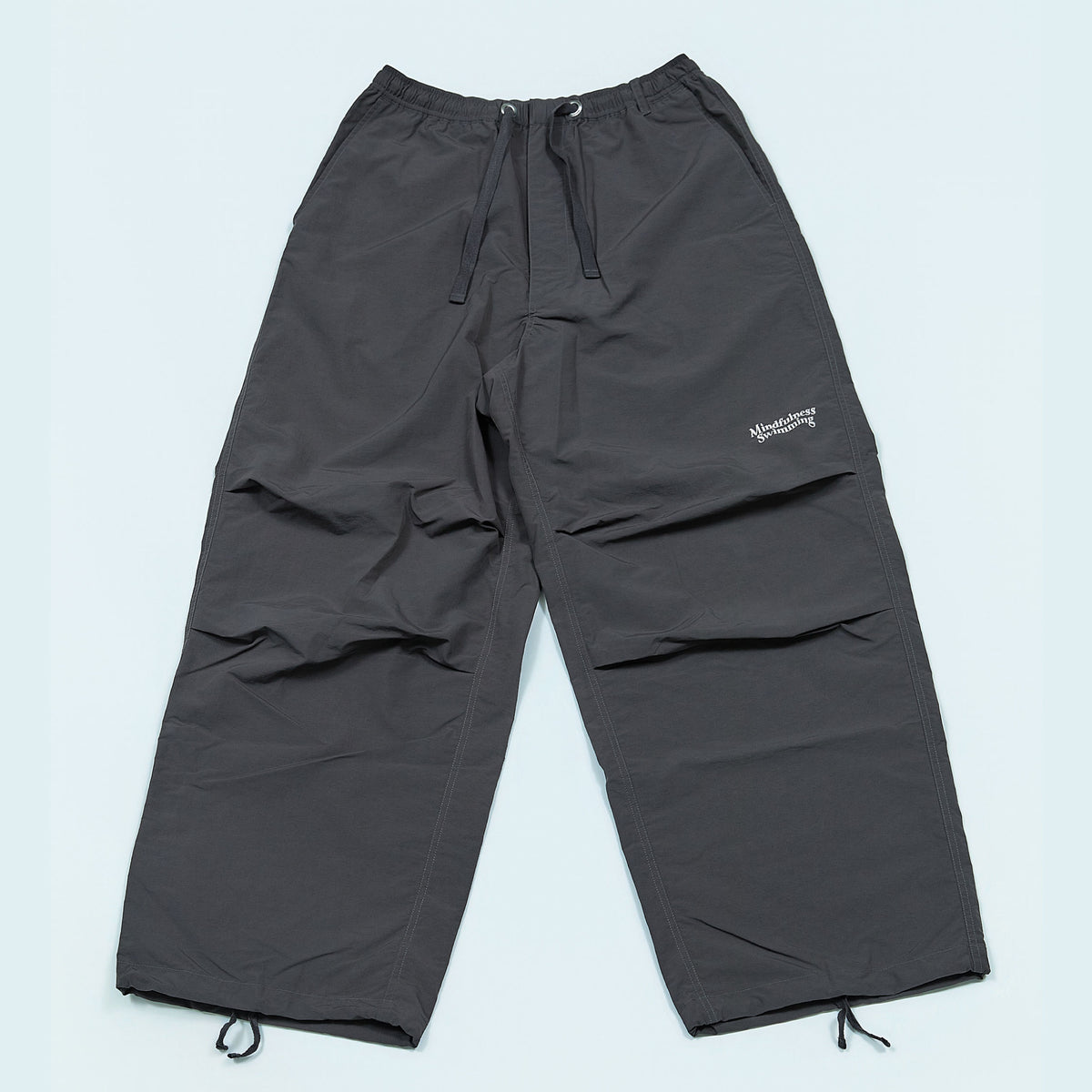 NYLON TRACK TROUSERS “MINDFULNESS SWIMMING” ー GRY