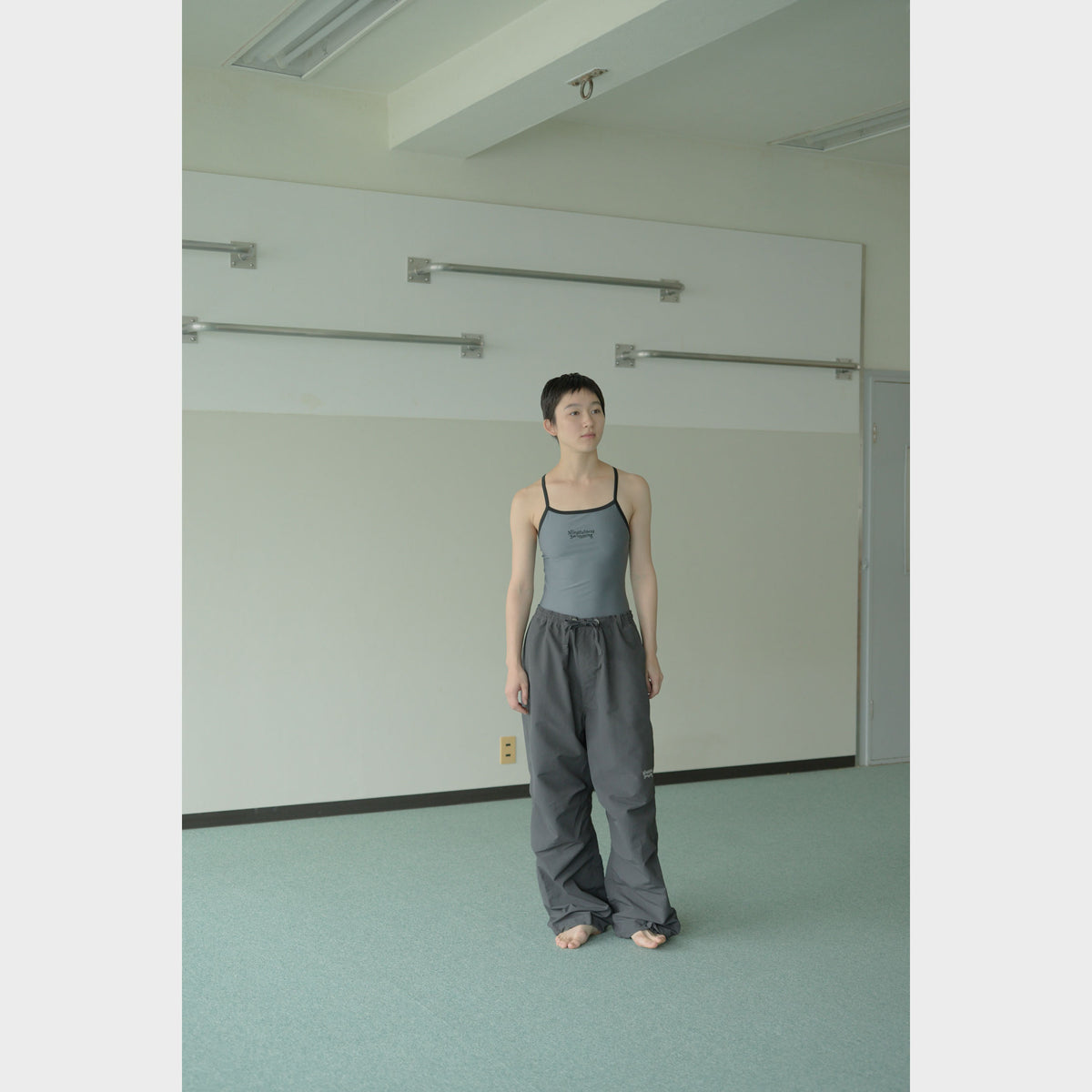 NYLON TRACK TROUSERS “MINDFULNESS SWIMMING” ー GRY