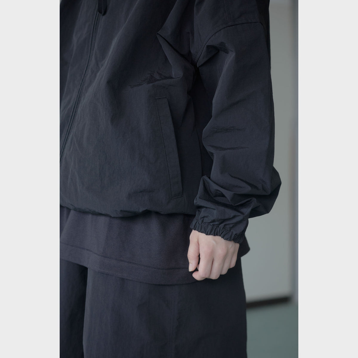 NYLON TRACK BLOUSON “MINDFULNESS SWIMMING” ー BLK
