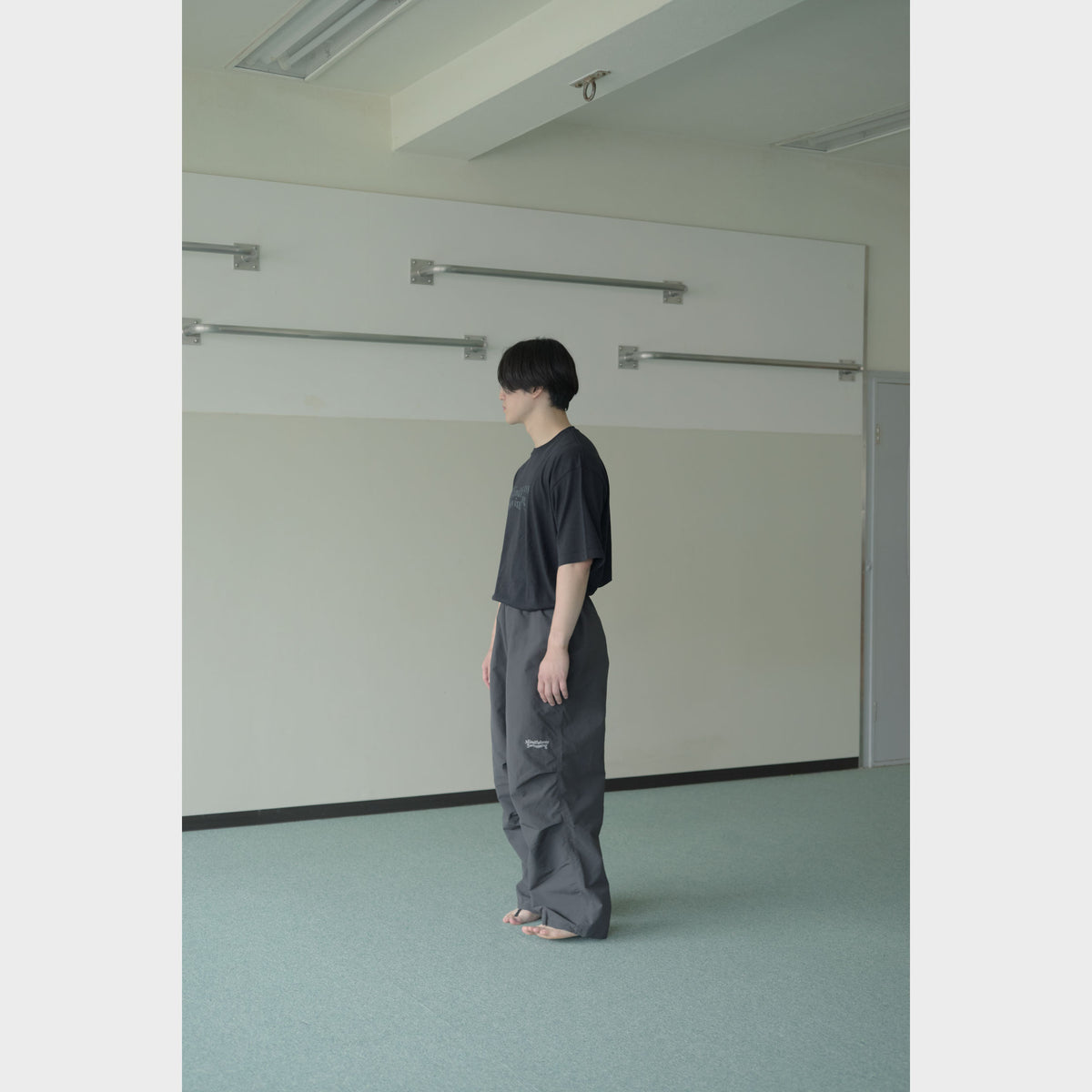 NYLON TRACK TROUSERS “MINDFULNESS SWIMMING” ー GRY