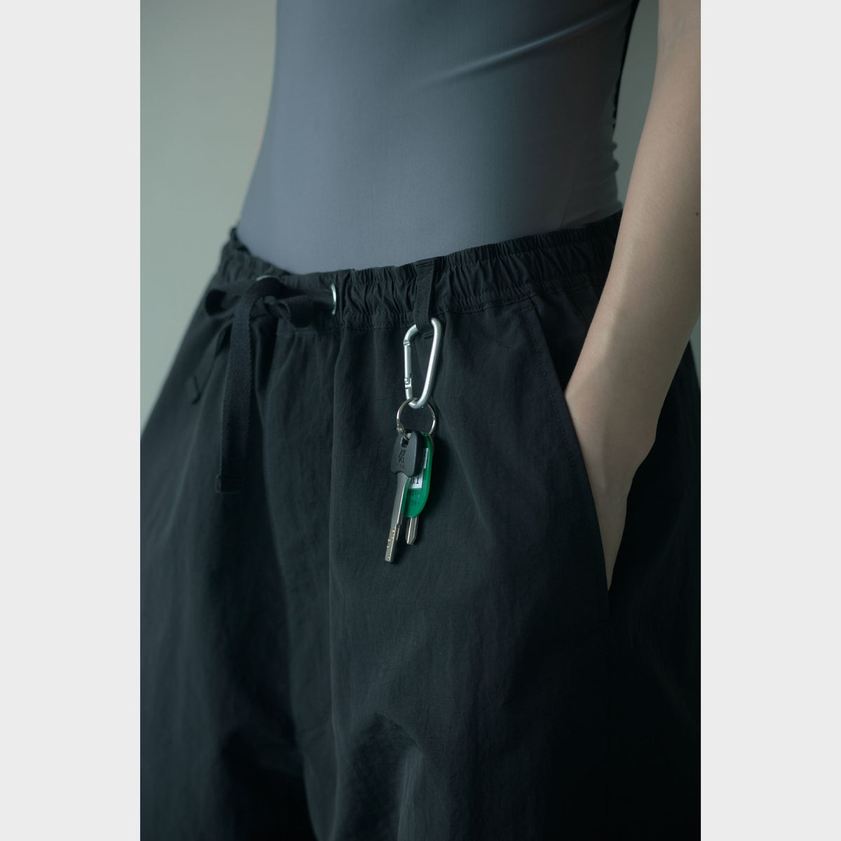NYLON TRACK TROUSERS “MINDFULNESS SWIMMING” ー BLK