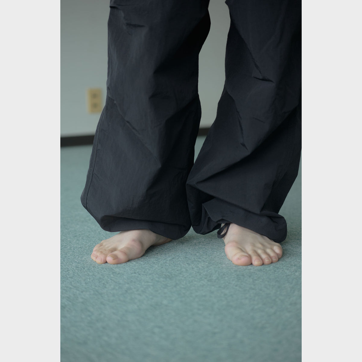 NYLON TRACK TROUSERS “MINDFULNESS SWIMMING” ー BLK