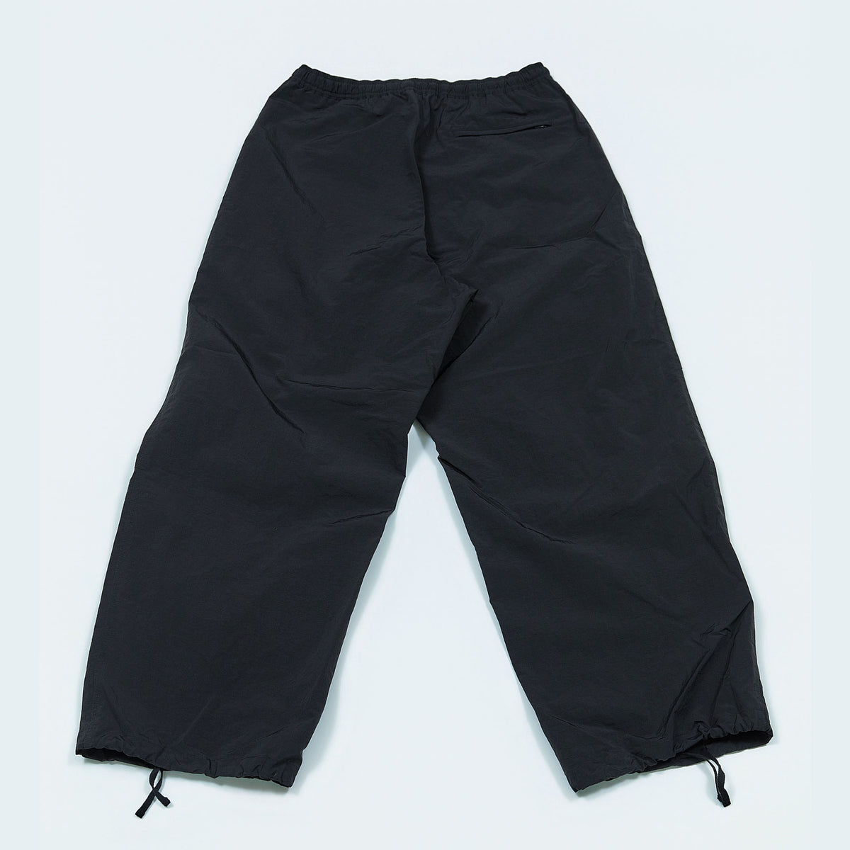 NYLON TRACK TROUSERS “SUN” ー BLK