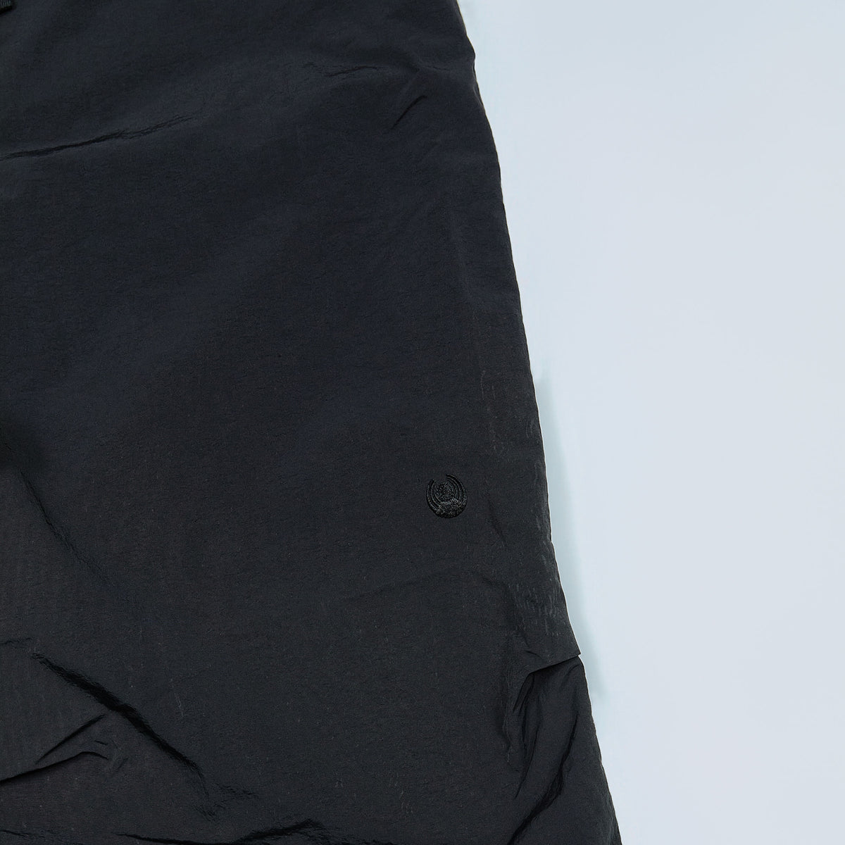 NYLON TRACK TROUSERS “SUN” ー BLK